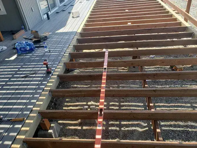 Deck joist framing in progress by J&V Builders in Central Washington